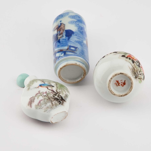 601 - THREE CHINESE PORCELAIN SNUFF BOTTLES including an underglaze blue and copper red cylindrical bottle... 