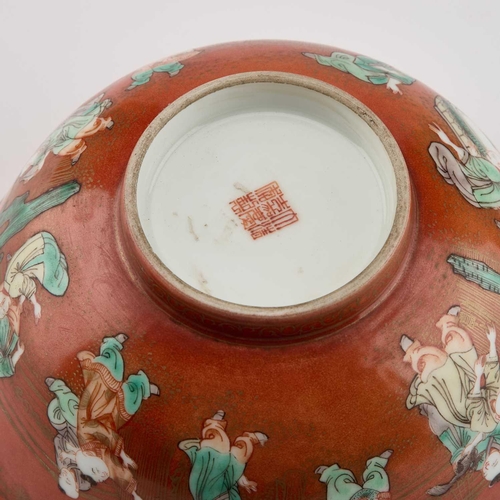 607 - A CHINESE CORAL-GROUND FAMILLE VERTE 'BOYS' BOWL decorated with enamels and gilt on a coral-red grou... 