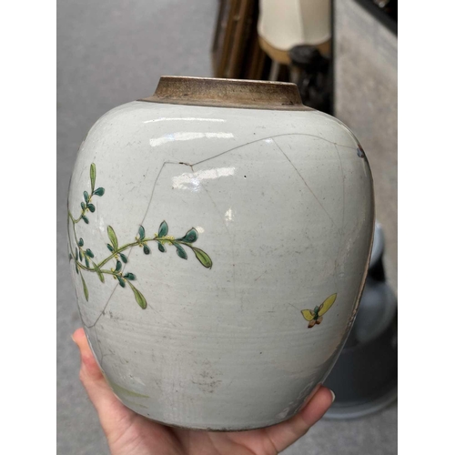 624 - A CHINESE FAMILLE ROSE GINGER JAR painted with flowers and rockwork; together with a Chinese yellow ... 