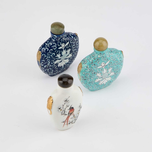 628 - THREE CHINESE PORCELAIN SNUFF BOTTLES 20th Century. (3) Tallest 6.8cm