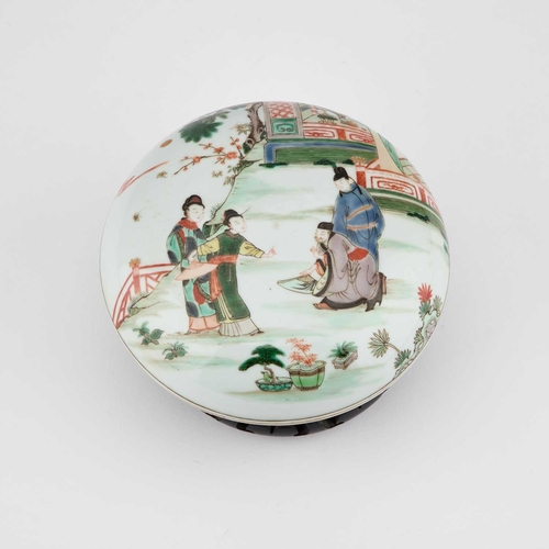 631 - A CHINESE FAMILLE VERTE BOX AND COVER circular, painted with figures, bears a six-character mark in ... 