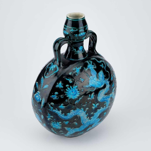 640 - A CHINESE 'DRAGON' MOON FLASK tubelined and turquoise painted to either side with a dragon and scrol... 