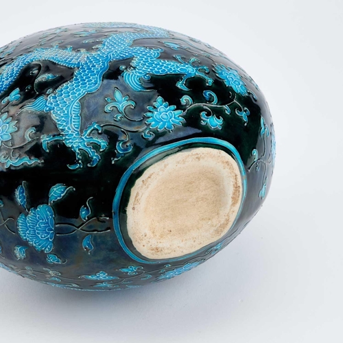 640 - A CHINESE 'DRAGON' MOON FLASK tubelined and turquoise painted to either side with a dragon and scrol... 