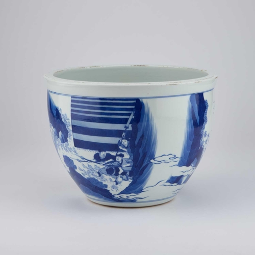 643 - A CHINESE BLUE AND WHITE JARDINIÈRE painted with a figural scene depicting various warriors on the b... 