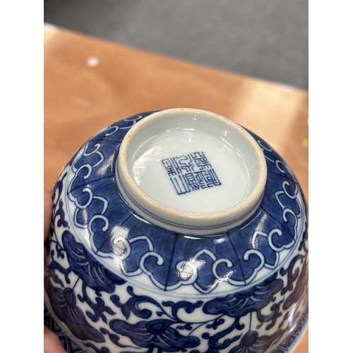 644 - A CHINESE BLUE AND WHITE BOWL underglaze blue painted with flowers and tendrils, the interior furthe... 