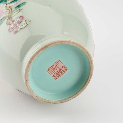 654 - A CHINESE FAMILLE ROSE CELADON-GROUND VASE the ovoid body with a waisted neck, decorated in Famille ... 