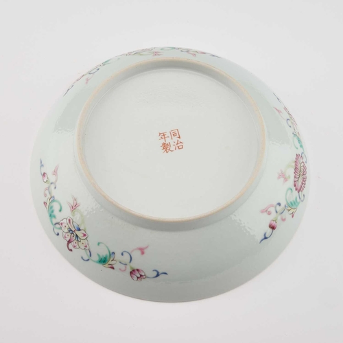 657 - A CHINESE FAMILLE ROSE YELLOW-GROUND DISH circular with rounded sides, decorated with six 'shou' med... 