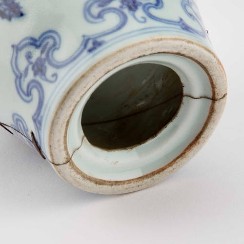 660 - A CHINESE BLUE AND WHITE VASE the tapering body underglaze blue painted with fruiting vine between r... 