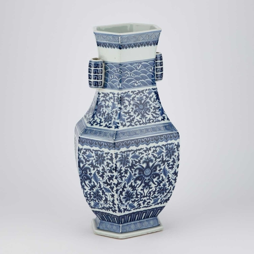 672 - A CHINESE BLUE AND WHITE HEXAGONAL VASE, HU the faceted vase decorated around the shoulder and body ... 