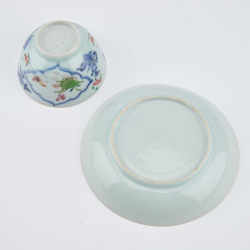 698 - V AN 18TH CENTURY CHINESE FAMILLE ROSE TEA BOWL AND SAUCER the tea bowl decorated with two reserves ... 