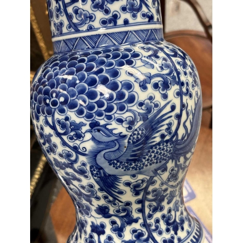 705 - A CHINESE BLUE AND WHITE YEN-YEN VASE painted with Fenghuang amidst fruiting foliate scrolls, a chev... 