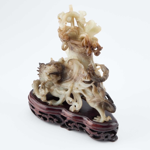 716 - A CHINESE BLACK AND WHITE JADE 'MYTHICAL BEAST' VASE AND COVER late Qing Dynasty/ Republic Period, t... 