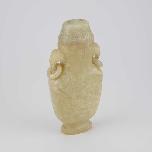 729 - A CHINESE JADE VASE AND COVER 19th/ 20th Century, with ring handles. 21cm high