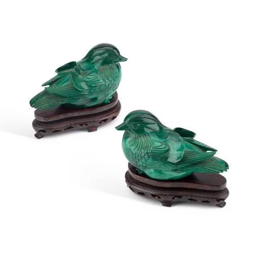 734 - A PAIR OF EARLY 20TH CENTURY CHINESE CARVED MALACHITE BIRD BOXES AND COVERS on carved and silver-inl... 