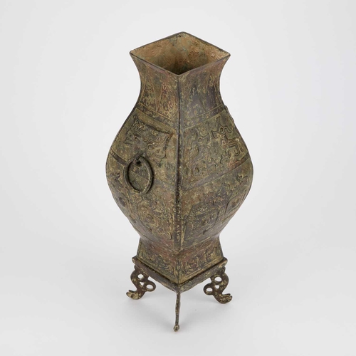 735 - A CHINESE BRONZE VASE in Archaistic style, on a stand. (2) 35.5cm high