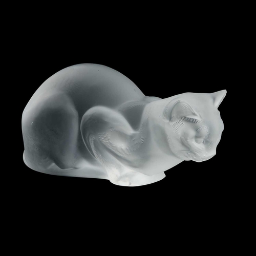 75 - A LALIQUE MODEL OF A CAT, 'CHAT ASSIS' frosted glass, signed Lalique France. 22.5cm longThere are a ... 