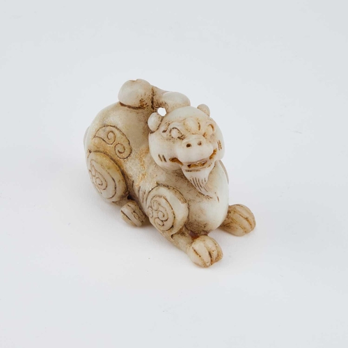 764 - A CHINESE JADE CARVING OF A BIXIE 7.8cm longIn generally good condition.