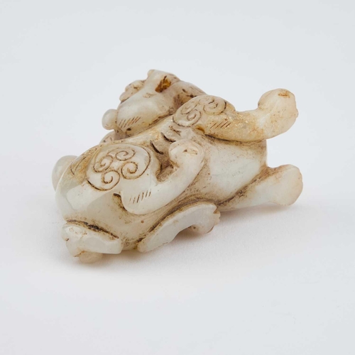 764 - A CHINESE JADE CARVING OF A BIXIE 7.8cm longIn generally good condition.