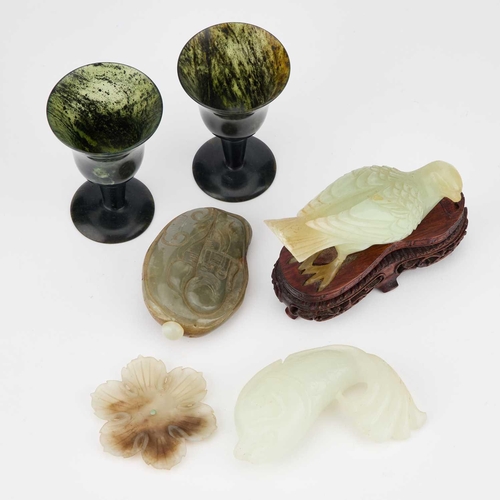 768 - A COLLECTION OF CHINESE JADE including a fish carving, snuff bottle, flowerhead brush rest, etc. (6)... 