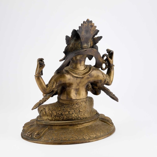 773 - A LARGE BRONZE FIGURE OF GANESH modelled sitting on a lotus with a rat by his right foot. 28cm high... 