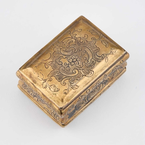 811 - AN 18TH CENTURY GILT-METAL AND ENAMEL SNUFF BOX rectangular with waisted sides, flat-chased with scr... 