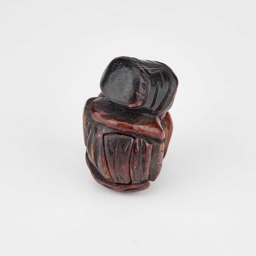 823 - A 19TH CENTURY PRIMITIVE FIGURAL SNUFF BOX naively carved as a squatting plump woman with rosy cheek... 