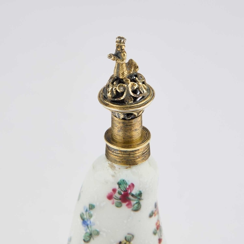 824 - AN 18TH CENTURY PORCELAIN SCENT FLASK painted with summer flowers, the screw stopper surmounted by t... 