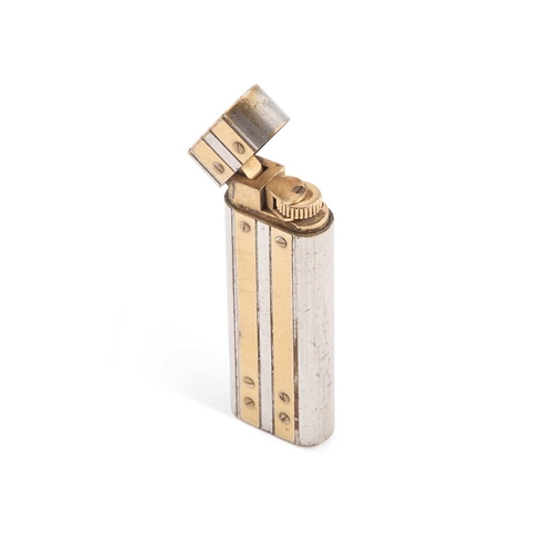 831 - A CARTIER BI-COLOURED METAL LIGHTER signed Cartier Paris, no. 94002M. 7cm highThe lighter appears to... 