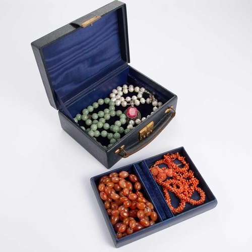 857 - A COLLLECTION OF CORAL, PEARL AND JADE JEWELLERY comprising two coral bead necklaces, a floral carve... 