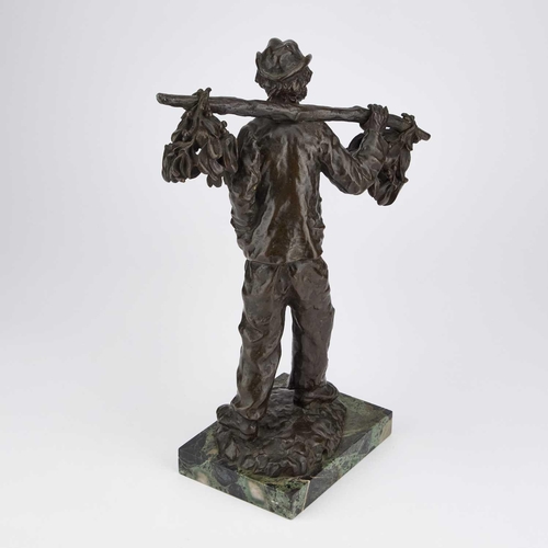 912 - CHARLES EMILE JONCHERY (FRENCH, 1873-1937), A BRONZE FIGURE OF AN ELDERLY GENTLEMAN carrying two bun... 