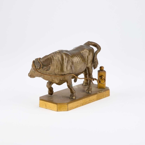 922 - A BRONZE MODEL OF A BULL, LATE 19TH/ EARLY 20TH CENTURY modelled standing tethered to a post. 15cm l... 