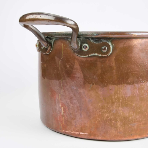 54 - A 19TH CENTURY COPPER FISH KETTLE of oval form, with a rolled top edge and two brass carrying handle... 