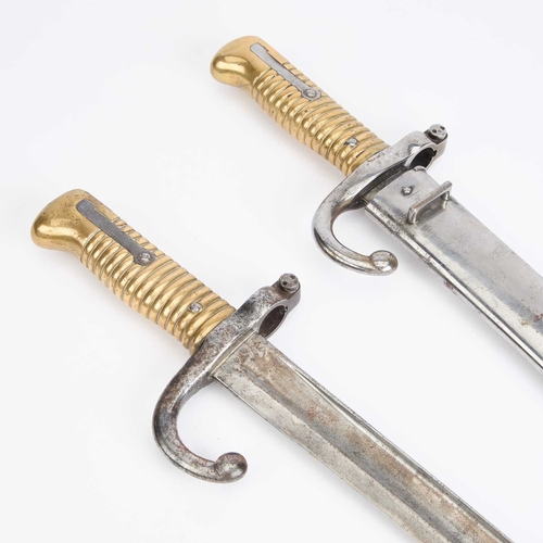 7 - TWO FRENCH 1866 PATTERN CHASSEPOT SWORD BAYONETS the first inscribed Mre Imp ale de St. Etienne and ... 