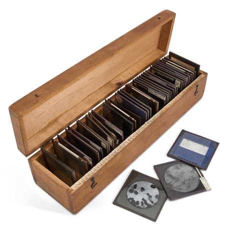 85 - A BOXED COLLECTION OF MEDICAL GLASS SLIDES including leprosy, bubonic plague, cholera, etc. (37 slid... 