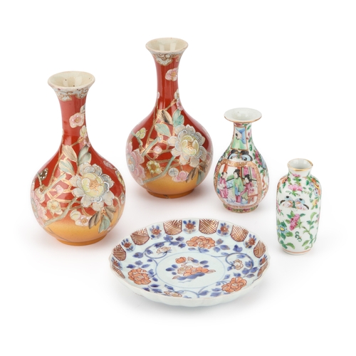 102 - A GROUP OF ORIENTAL CERAMICS comprising two small Chinese Famille Rose vases, an Imari dish and a pa... 