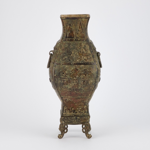 157 - A CHINESE BRONZE VASE in Archaistic style, on a stand. (2) 35.5cm high