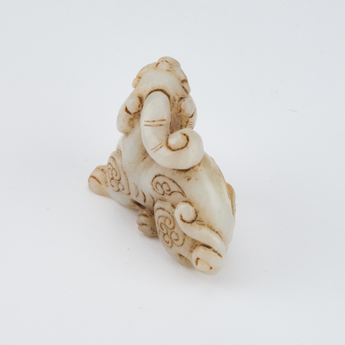 163 - A CHINESE JADE CARVING OF A BIXIE 7.8cm longIn generally good condition.