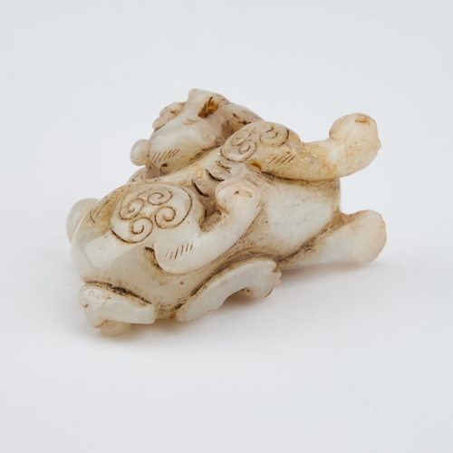 163 - A CHINESE JADE CARVING OF A BIXIE 7.8cm longIn generally good condition.