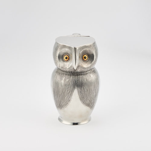 175 - A VERY RARE LIBERTY & CO TUDRIC PEWTER LIDDED 'OWL' JUG cast in the form of an owl, with inset eyes,... 