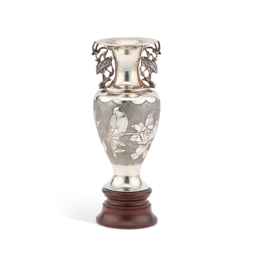 217 - A CHINESE SILVER VASE by Zeng, Shanghai, c.1900, of baluster form, chased with a parrot perched on a... 