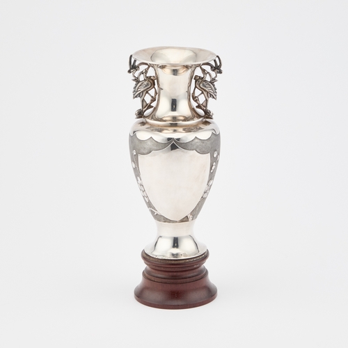 217 - A CHINESE SILVER VASE by Zeng, Shanghai, c.1900, of baluster form, chased with a parrot perched on a... 