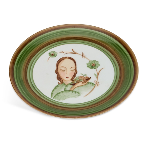 36 - A 1930'S HAND-PAINTED PLATE painted with the head and shoulders of a girl, painted marks verso. 23cm... 