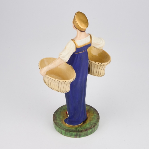 49 - A RARE RUSSIAN PORCELAIN FIGURE OF A LADY, POSSIBLY ST. PETERSBURG in a blue dress carrying two bask... 