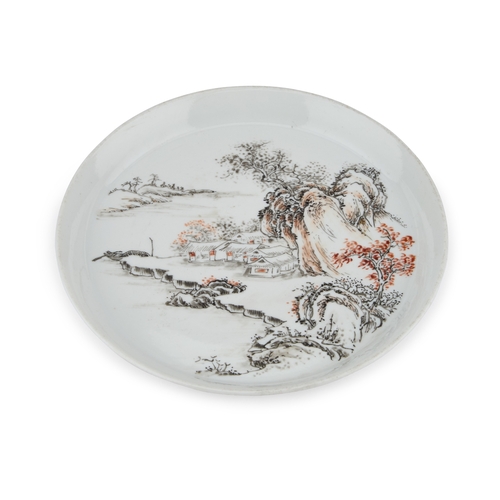 65 - A CHINESE 'LANDSCAPE' SAUCER DISH circular with raised sides, bears a six-character mark in double c... 