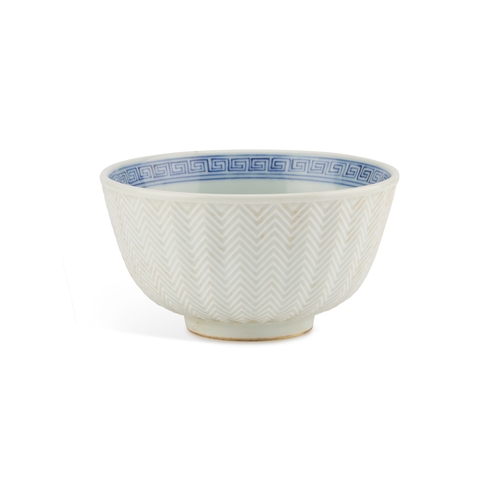 70 - A CHINESE BLUE AND WHITE 'FISH' BOWL with a moulded exterior, the interior underglaze blue decorated... 