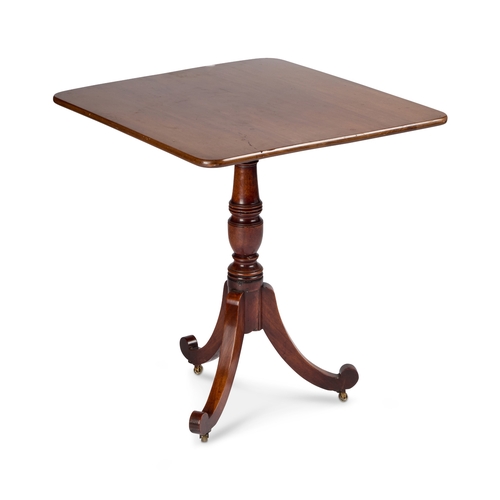 766 - A EARLY 19TH CENTURY MAHOGANY TILT-TOP TRIPOD TABLE the off-square top raised on a ring-turned balus... 