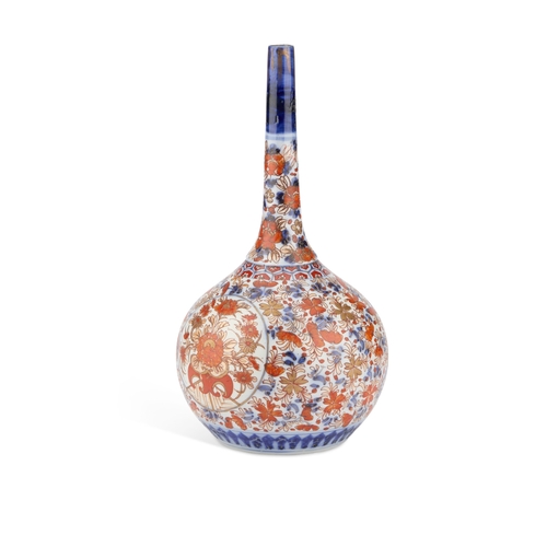 86 - A 19TH CENTURY JAPANESE IMARI BOTTLE VASE with a slender neck. 31cm high