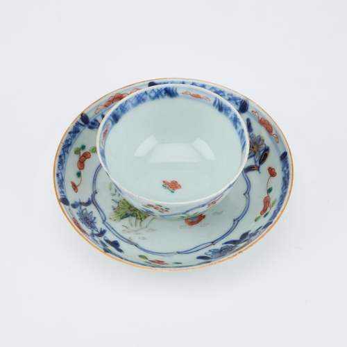 92 - V AN 18TH CENTURY CHINESE FAMILLE ROSE TEA BOWL AND SAUCER the tea bowl decorated with two reserves ... 