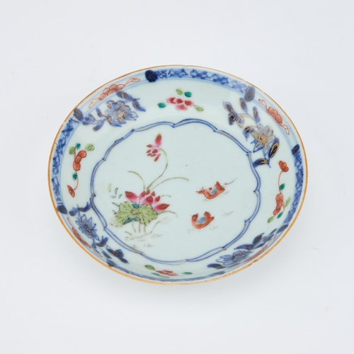 92 - V AN 18TH CENTURY CHINESE FAMILLE ROSE TEA BOWL AND SAUCER the tea bowl decorated with two reserves ... 