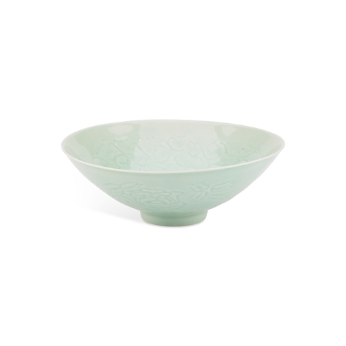 94 - A CHINESE CELADON-GROUND BOWL with incised and moulded decoration. 21cm diameter